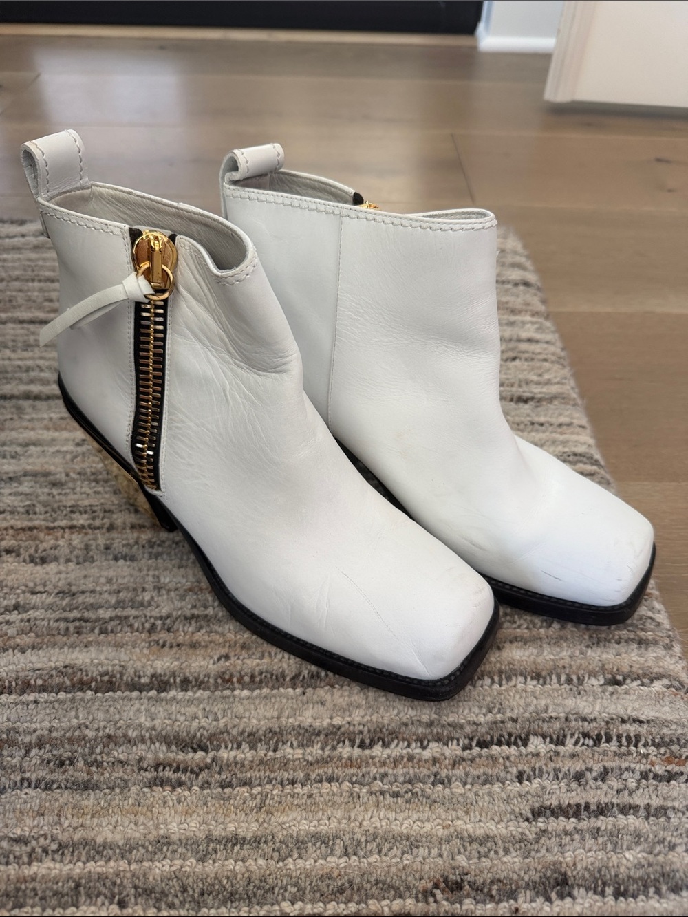 Giuseppe Zanotti White Leather Ankle Boots with Gold Zip Accent